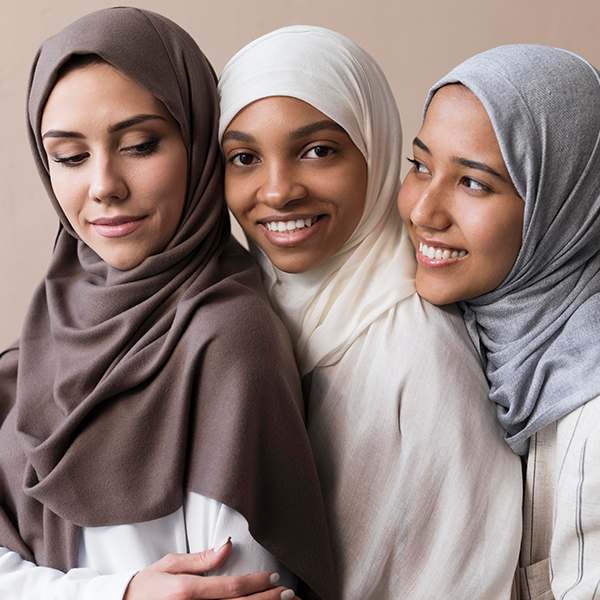 five-young-multicultural-volunteers-showing-thumbs-up-smiling